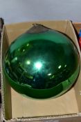 A LATE 19TH/EARLY 20TH CENTURY METALLIC GREEN GLASS WITCH'S BALL with metal mount and short length