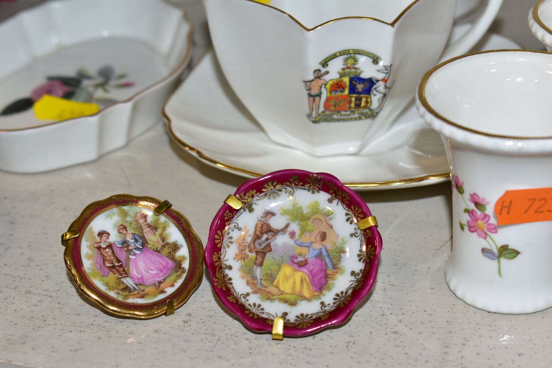 A GROUP OF CERAMIC FIGURES AND ORNAMENTS, including Capo Di Monte tramp on a bench, elderly - Image 15 of 16