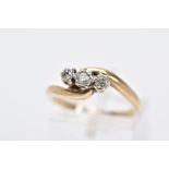 A 9CT GOLD THREE STONE DIAMOND RING, designed with three graduated round brilliant cut diamonds,