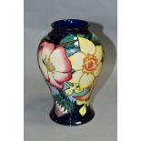 A MOORCROFT POTTERY INVERTED BALUSTER SHAPED VASE, 'EIIR, GOLDEN JULBILEE 2002' florally