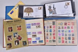 A BOX CONTAINING THREE STAMPS ALBUMS including a cover album and a few odds of GB decimal mint