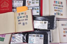 A COLLECTION OF STAMPS IN EIGHT ALBUMS including three cover albums, main value is in an SG KGVI