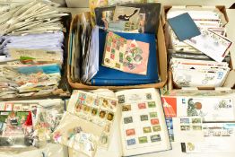 A LARGE COLLECTION OF STAMPS in three boxes housed in albums and loose in many packets, plenty to