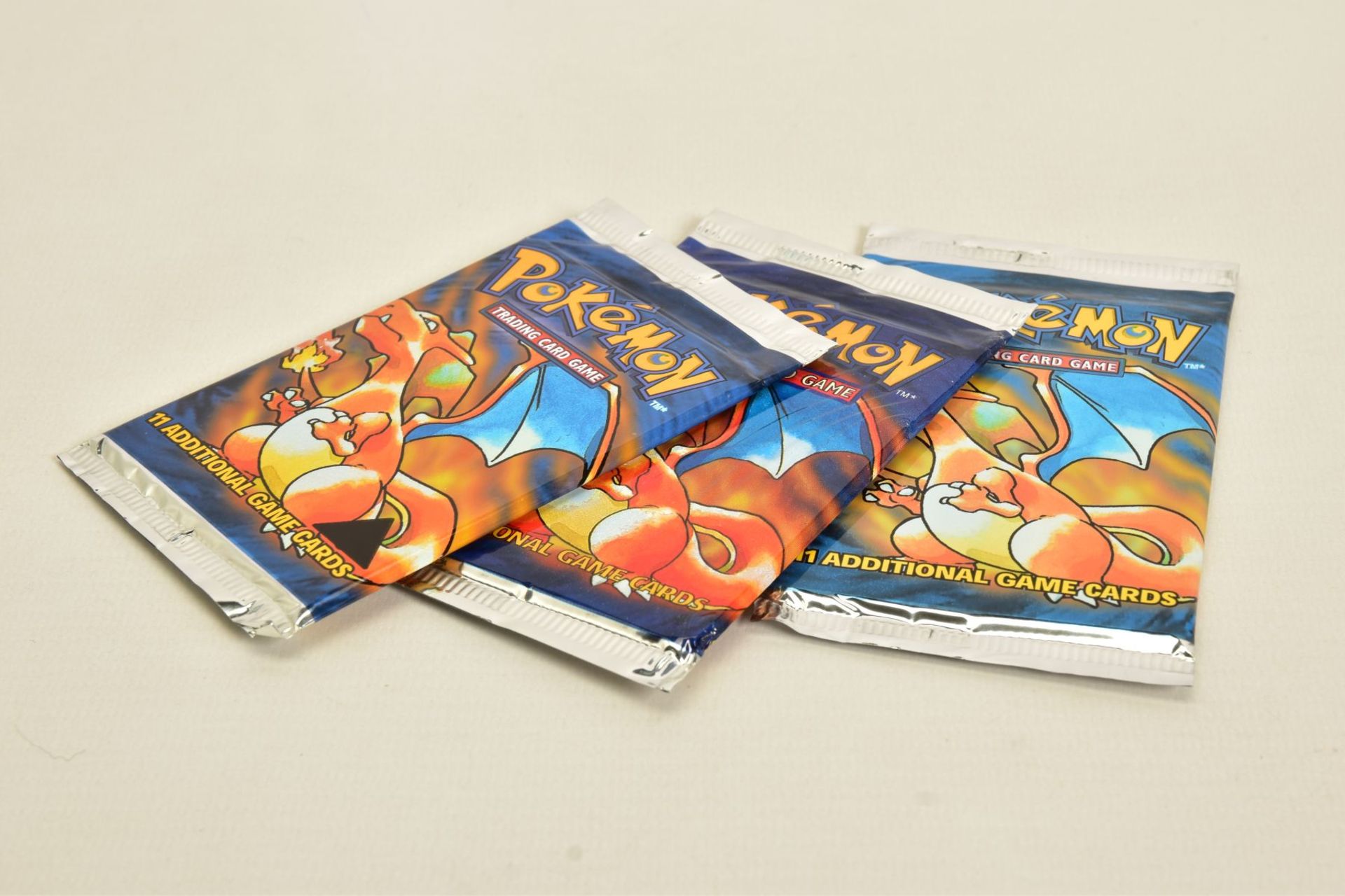 A SEALED POKEMON BASE SET BLACK TRIANGLE ERROR PRINTED BOOSTER PACK, with two other sealed Base - Image 3 of 4
