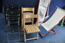 A SELECTION OF MODERN FOLDING CHAIRS including a set of metal framed with black plastic slats, a set