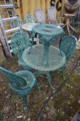 AN ALUMINIUM CIRCULAR GARDEN TABLE, painted green, diameter 68cm x height 66cm, three chairs and a