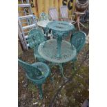 AN ALUMINIUM CIRCULAR GARDEN TABLE, painted green, diameter 68cm x height 66cm, three chairs and a