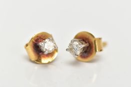 A PAIR OF YELLOW METAL DIAMOND STUD EARRINGS, each designed with a claw set round brilliant cut