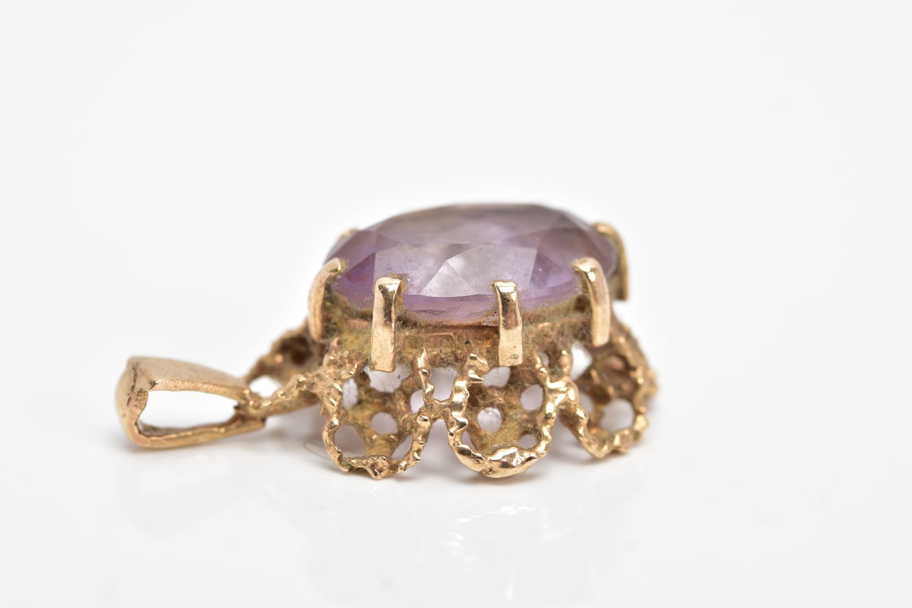 A 9CT GOLD AMETHYST PENDANT, of an oval form, claw set oval cut amethyst, within an openwork rope - Image 3 of 5