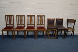 A SET OF FOUR OAK ARTS AND CRAFTS DINING CHAIRS with red drop in seat pads (some movements in