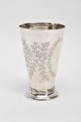 A LATE VICTORIAN SILVER TAPERING WINE BEAKER, foliate engraving with a vacant oval shape,