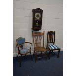 AN EARLY 20TH CENTURY OAK WALL CLOCK (winding key and pendulum), height 77cm together with an