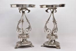 A PAIR OF ELKINGTON AND CO SILVER PLATED TABLE CENTREPIECES, Etruscan style each raised on