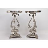 A PAIR OF ELKINGTON AND CO SILVER PLATED TABLE CENTREPIECES, Etruscan style each raised on