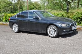 A 2014 BMW 320D LUXURY 4 DOOR SALOON CAR in black, with full black leather interior, two Key Fobs,