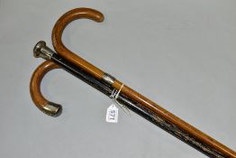 TWO SILVER MOUNTED WALKING STICKS AND AN EBONISED WALKING CANE, the cane with damaged silver mount