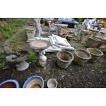 A SET OF THREE COMPOSITE CIRCULAR GARDEN PLANTERS, dimeter 39cm x height 32cm, along with a