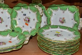 A MID TO LATE 19TH CENTURY ENGLISH PORCELAIN DESSERT SERVICE, green and gilt borders and the centres