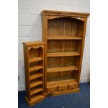 A MODERN PINE OPEN BOOKCASE with three fixed shelves above three small drawers, width 91cm x depth
