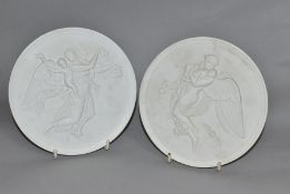 A PAIR OF ROYAL COPENHAGEN CIRCULAR PARIAN PLAQUES, both moulded in relief with angels with putti,