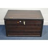 A STAINED PINE STORAGE BOX with twin drop handles, painted interior and an internal tray, width 94cm
