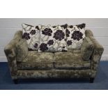 A GREY UPHOLSTERED TWO SEATER SETTEE, with floral back cushions (very good condition)