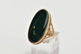 A 9CT GOLD BLOODSTONE RINGS, of an elongated oval form, openwork scroll detailed gallery, hallmarked