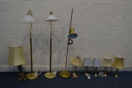 A COLLECTION OF MODERN BRASS LAMPS comprising of three floor lights, a large table lamp and five