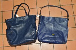 TWO LADIES NAVY BLUE LEATHER HANDBAGS, one by 'The Bridge', width 38cm x depth 32cm and the other by