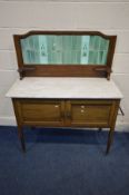 AN EDWARDIAN MAHOGANY AND STRUNG INLAID WASHSTAND, with an Art Nouveau tile back, and marble top,