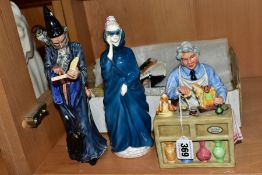 FOUR ROYAL DOULTON FIGURES, comprising 'The China Repairer' HN2943, 'Masque', HN2554, 'The Wizard'