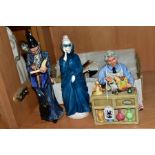 FOUR ROYAL DOULTON FIGURES, comprising 'The China Repairer' HN2943, 'Masque', HN2554, 'The Wizard'
