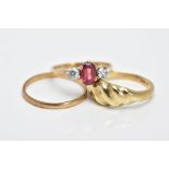 THREE 9CT GOLD RINGS, the first a three stone ring designed with a central oval cut garnet flanked