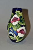 A MOORCROFT POTTERY LIMITED EDITION VASE, Pears and Flowers designed and signed by Emma Bossons,
