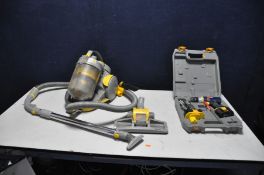 A DYSON DC05 PULL ALONG VACUUM CLEANER (PAT pass and working) and a case Ryobi 14.4v cordless