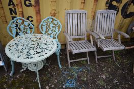 AN ALUMINIUM CIRCULAR GARDEN TABLE, decorated with grapes and fruiting vine , diameter 66cm x height