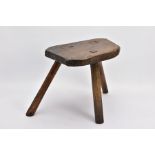 A LATE 19TH CENTURY OAK AND ASH THREE LEGGED MILKING STOOL, turned legs later replacements, height