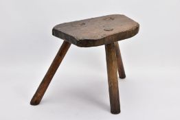 A LATE 19TH CENTURY OAK AND ASH THREE LEGGED MILKING STOOL, turned legs later replacements, height