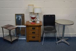 A SOLID OAK THREE DRAWER BEDSIDE CABINET together with a circular stainless steel table, chair,