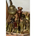 A BOX OF METALWARES, including brass door stops cast as horses and stags, brass models of canons,