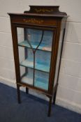 AN EDWARDIAN MAHOGANY AND INLAID CHINA CABINET, with later added detailing, glazed door enclosing