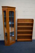 A TEAK SLOPPED OPEN BOOKCASE together with a modern glazed corner cupboard with a mirrored back