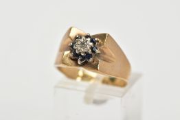 A 9CT GOLD DIAMOND AND SAPPHIRE CLUSTER RING, slightly raised cluster set with a central single