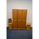 A MODERN PINE THREE DOOR WARDROBE, width 123cm x depth 55cm x height 186cm, two pine three drawer