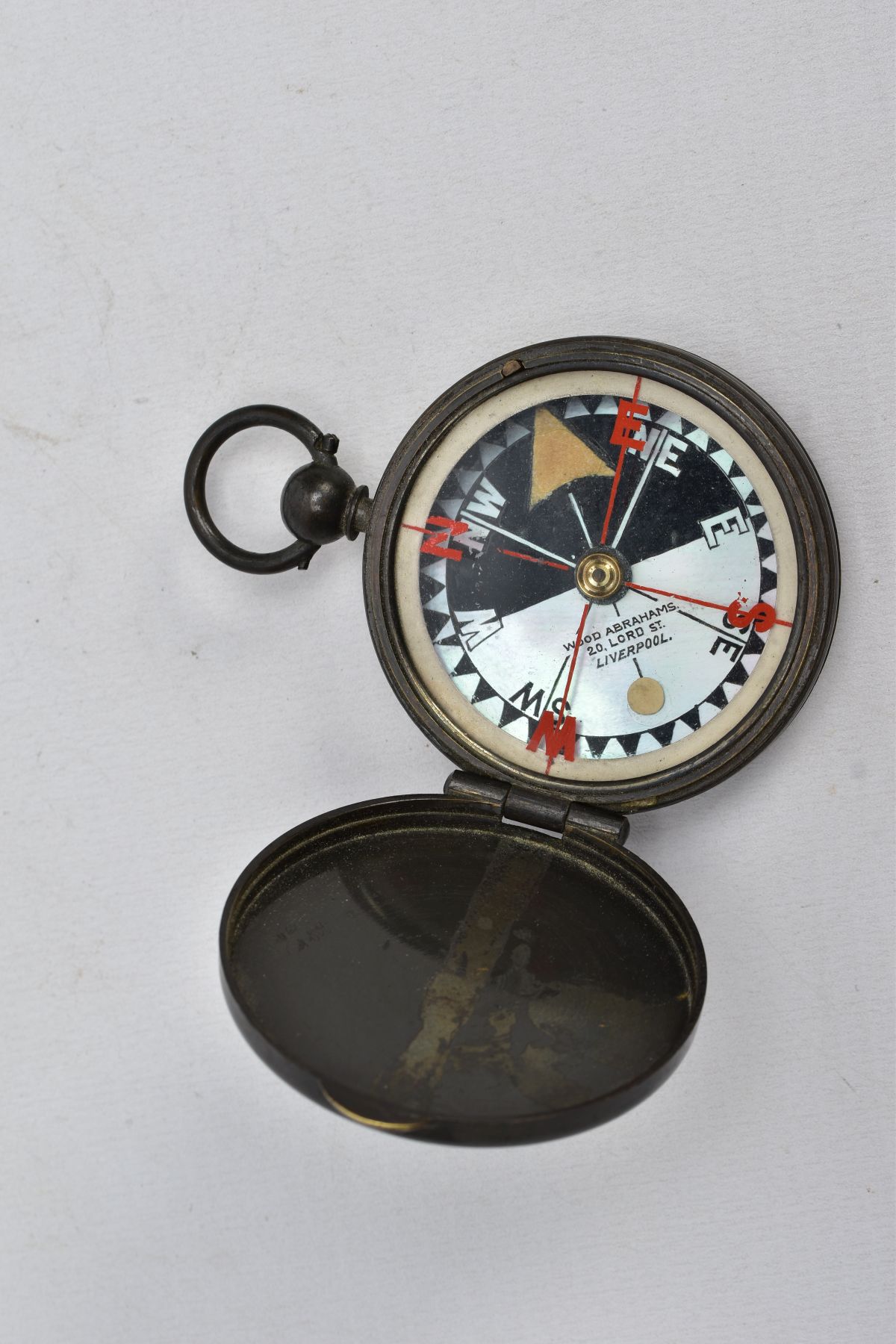 A 'WOOD ABRAHAMS' COMPASS, base metal compass, round mother of pearl dial, signed 'Wood Abrahams - Image 4 of 5