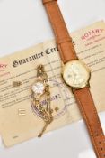 A LADY'S GOLD 'ROTARY' WRISTWATCH AND A 'LORUS' QUARTZ DISNEY THEMES WRISTWATCH, 'Rotary' hand wound