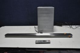 A LG NB4540 BLUETOOTH SOUNDBAR with Brushed stainless steel finish, remote and a LG S44A1-D wireless
