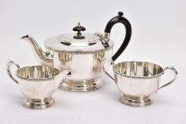 AN EARLY 20TH CENTURY THREE PIECE REGENT PLATE TEA SERVICE by Garrard & Co (Crown Jeweller)