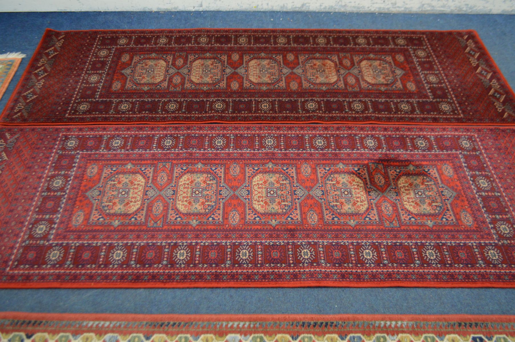 A PAIR OF WOOLLEN ANTIQUE ROYAL RED GROUND RUNNERS 82cm x 248cm, a woollen red runner and 67cm x - Bild 2 aus 6