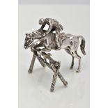 A SILVER SMALL HORSE AND JOCKEY ORNAMENT, measuring approximately 50mm in length x 70mm in height,